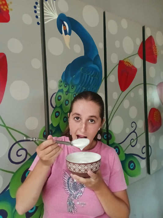 Kristi eating a bowl of homemade Fermentastic kefir