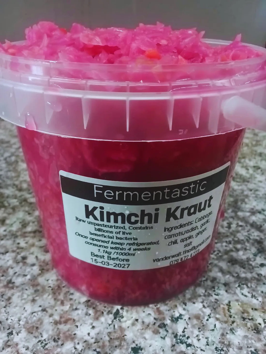 Fresh kimchi kraut served in a small tub